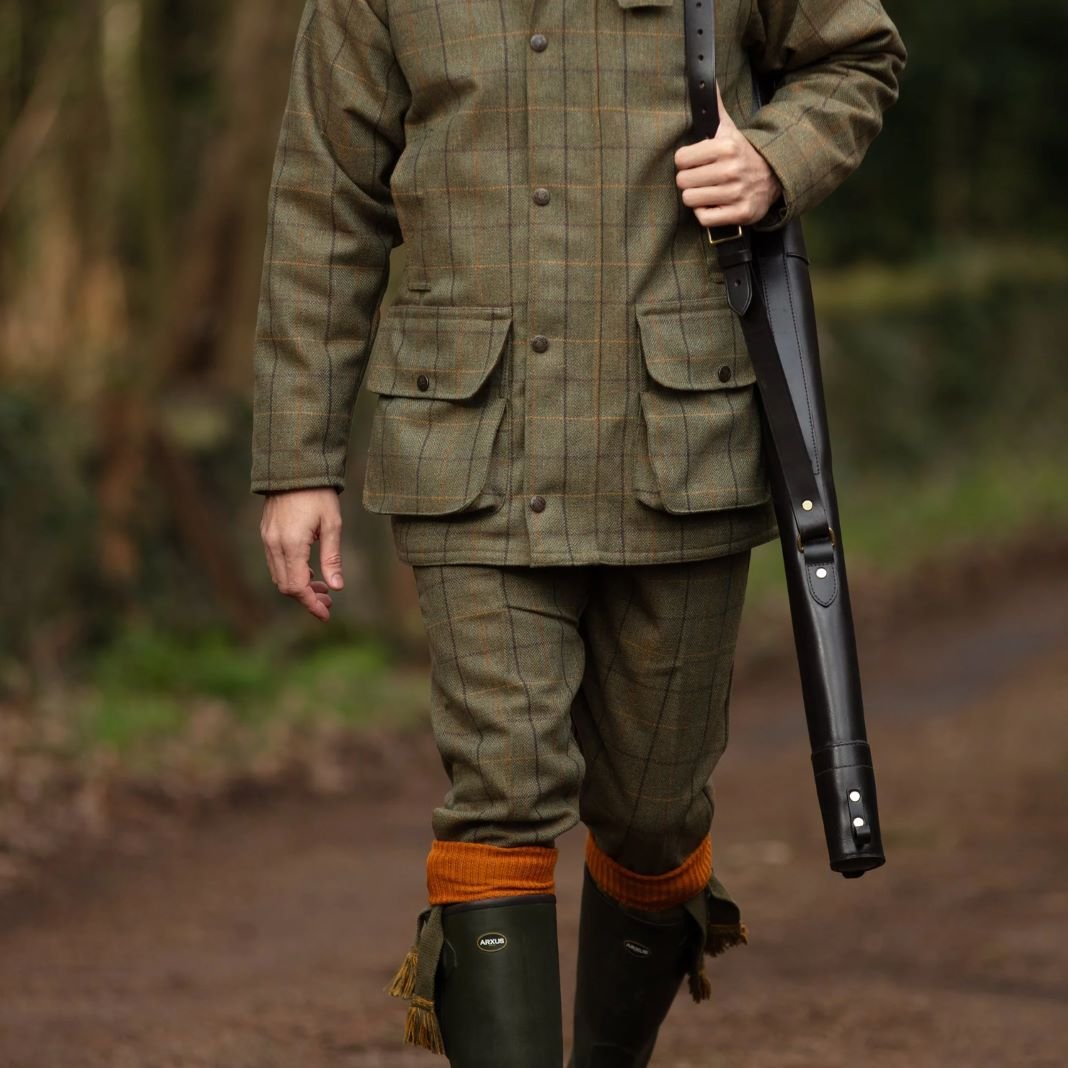 Green moleskin trousers with a soft finish, perfect for countryside outings.
